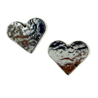 Two metal heart shapes with a brushed silver finish on a white background, slightly angled apart from each other.