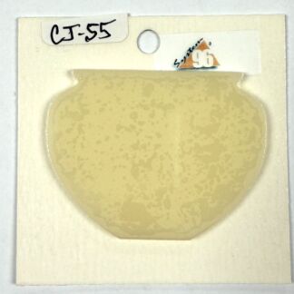 Ceramic glaze sample mounted on a white board labeled CJ-55, with a pale yellow mottled glaze on a rounded, bowl-like shape.